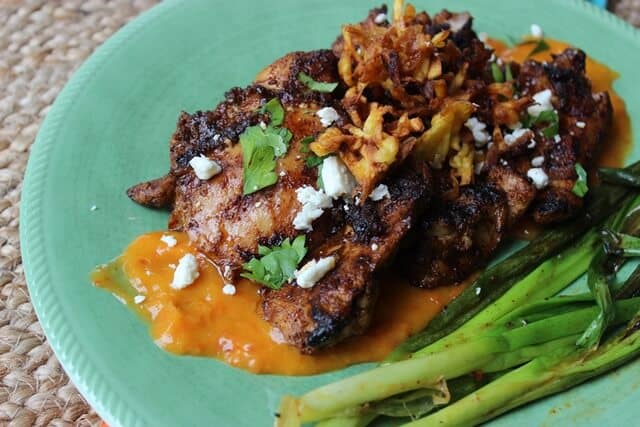 Grilled Chicken Thighs with Chorizo Sauce and Plantain Fries