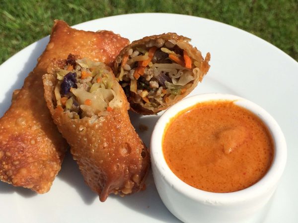 Pork And Broccoli Slaw Egg Rolls With Thai Curry Peanut Sauce